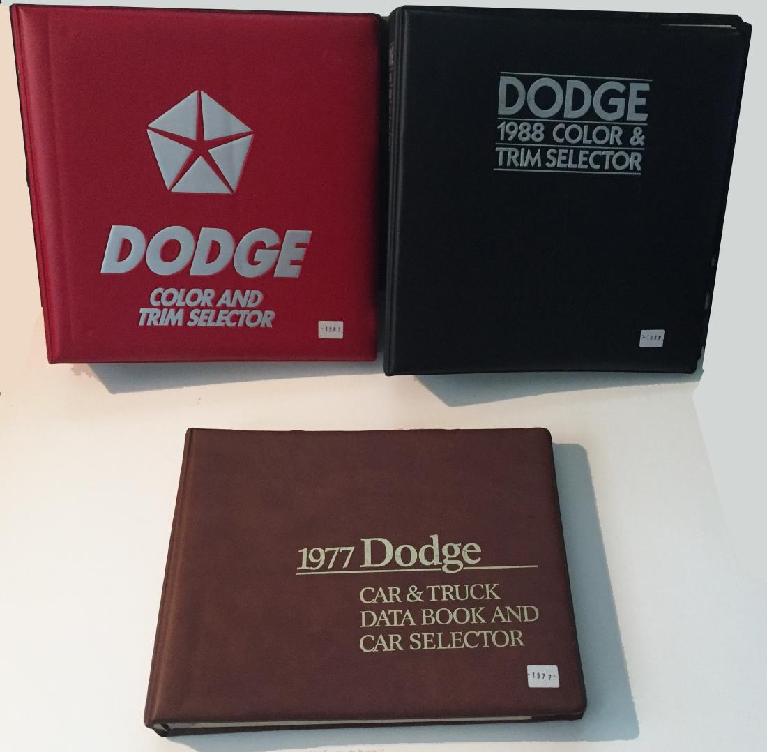 (3) DODGE DEALERSHIP COLOR & TRIM, DATA BOOKS - MOPAR: Includes: (1) 1987 Dodge Color & Trim Selector; includes: Shadow, Daytona, Lancer, Caravan, Aries K, Charger, Colt, Colt Vista, Diplomat, etc.; (1) 1988 Dodge Color & Trim Selector; includes: Dynasty,