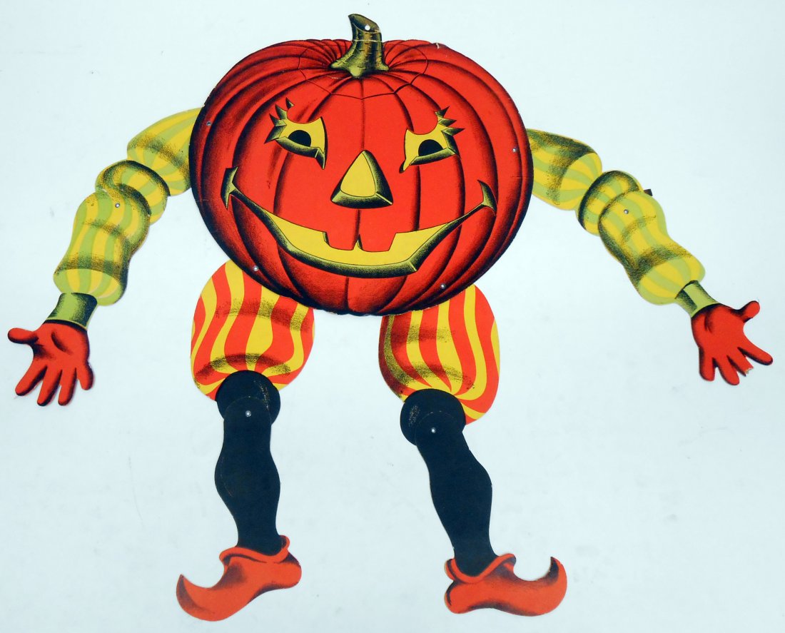 VINTAGE JACK O'LANTERN HALLOWEEN JOINTED DISPLAY: Die-cut jack o'lantern with jointed arms and legs; paper litho; "Made in U.S.A."; marked on reverse (in pen) "Oct 62"; fold lines around stem of pumpkin, tape repair to stem, loss to middle finger of 