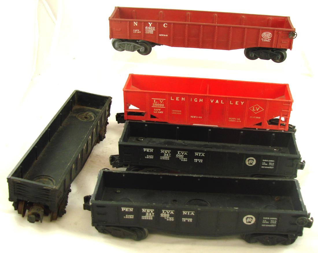 (5) LIONEL GONDOLA CARS: (2) 2542 NYC Gondola #34700; (1) 6032 Lionel Gondola; (1) 6076 Lehigh Valley Hopper; (1) 6462 NYC Gondola; longest L-10", G-VG