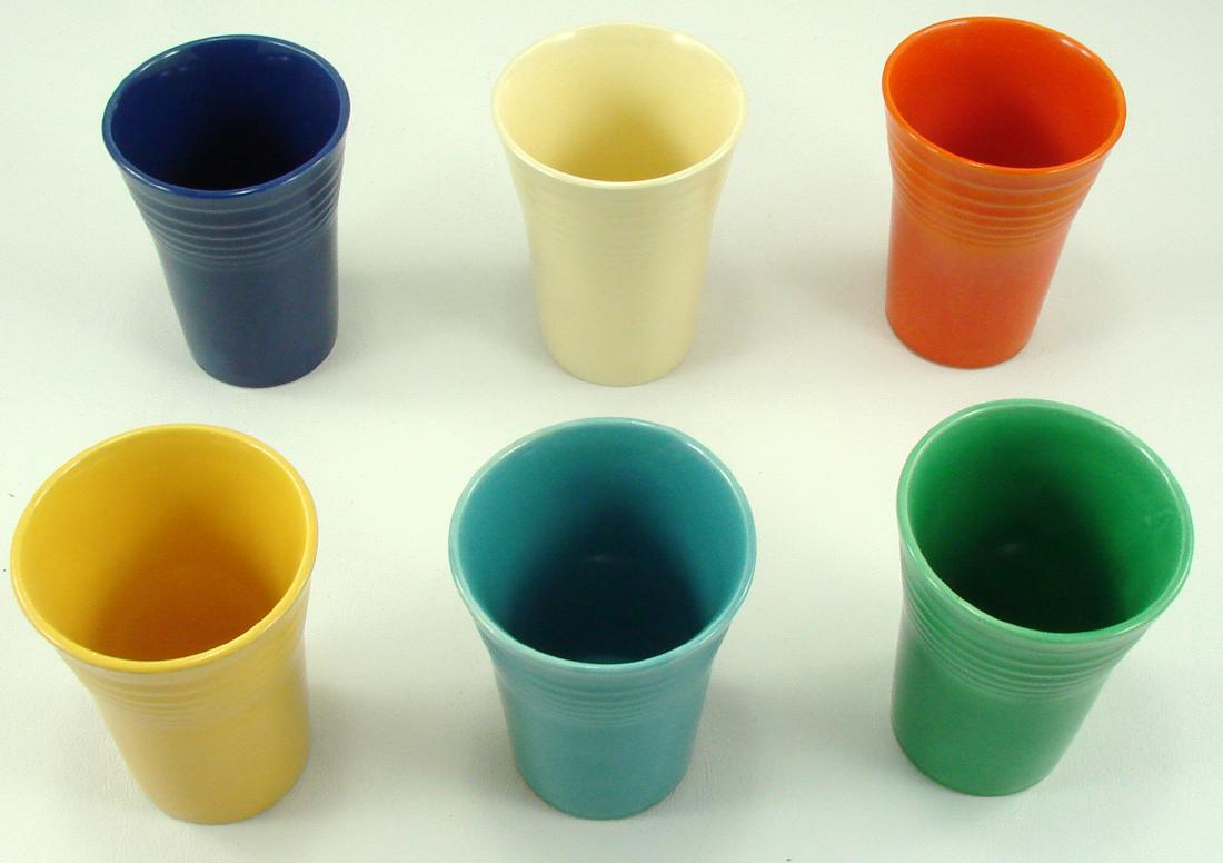 (6) VINTAGE FIESTA WATER TUMBLERS: In each of the original six colors: red, cobalt, green, yellow, ivory and turquoise; (5) with impressed "HLC (monogram) Fiesta Made in USA" mark; yellow tumbler impressed "Fiesta HLC USA"; yellow tumb