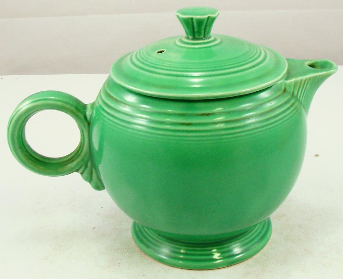 VINTAGE FIESTA LARGE TEAPOT GREEN: Green, impressed with "HLC (monogram) Fiesta Made in USA"; ring handle; H-6 11/16", L-9 1/4", EX