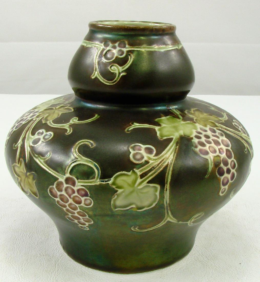 HELLOSINE WARE POTTERY VASE: Iridescent glaze, grape motif; stamped "Hellosine Ware Austria", impressed 21345; H-5 1/2", Dia.-5", EX