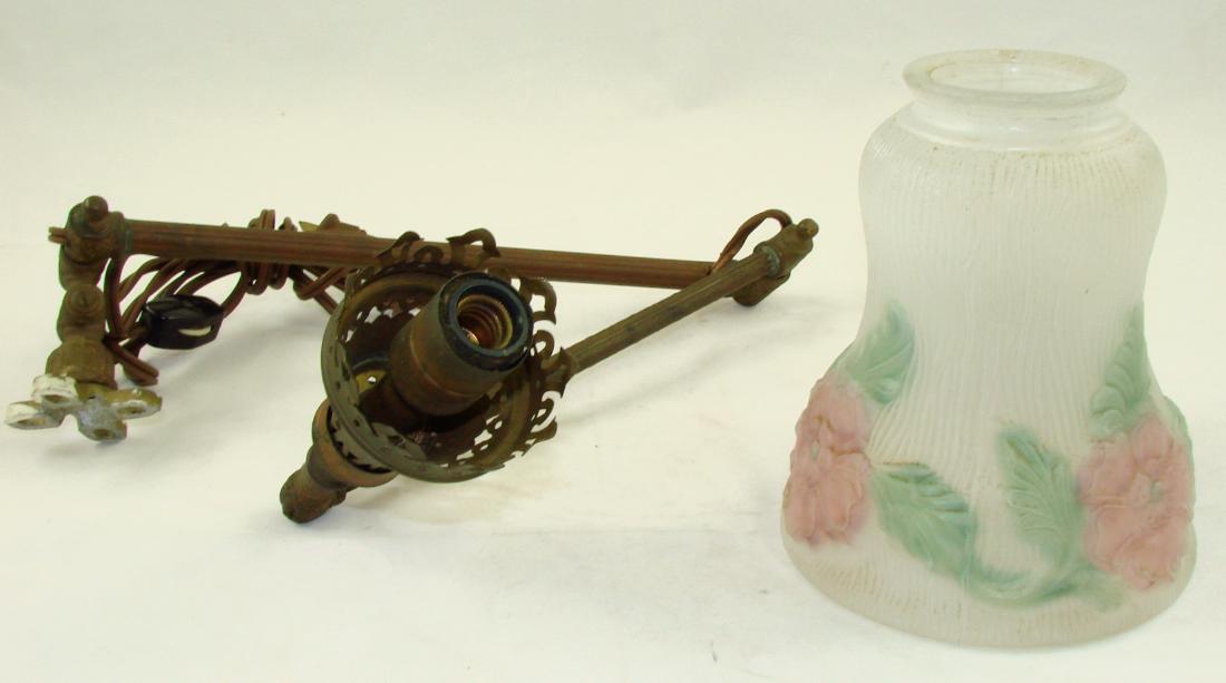 ADJUSTABLE WALL SCONCE & SHADE: Metal wall sconce with adjustable swing arm; socket takes a candelabra style bulb, lamp fitting stamped "Lindsay"; lamp works; 2 1/4" fitting shade with reverse painted floral motif, ribbed frosted gl