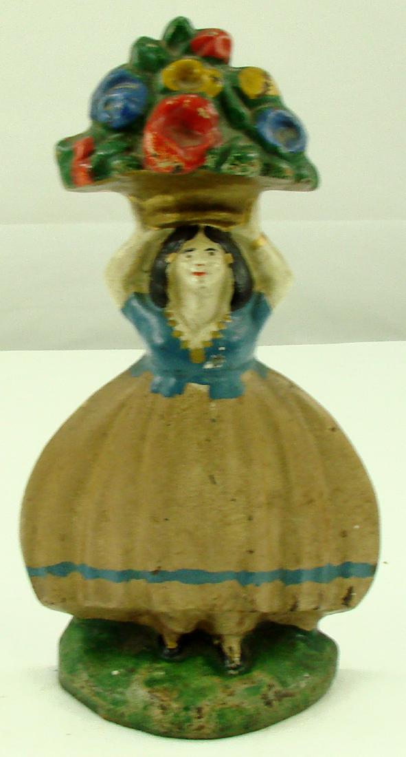 HUBLEY PEASANT GIRL DOORSTOP #5: Painted cast iron; paint overall good, some flakes and scrapes; H-9", VG-EX