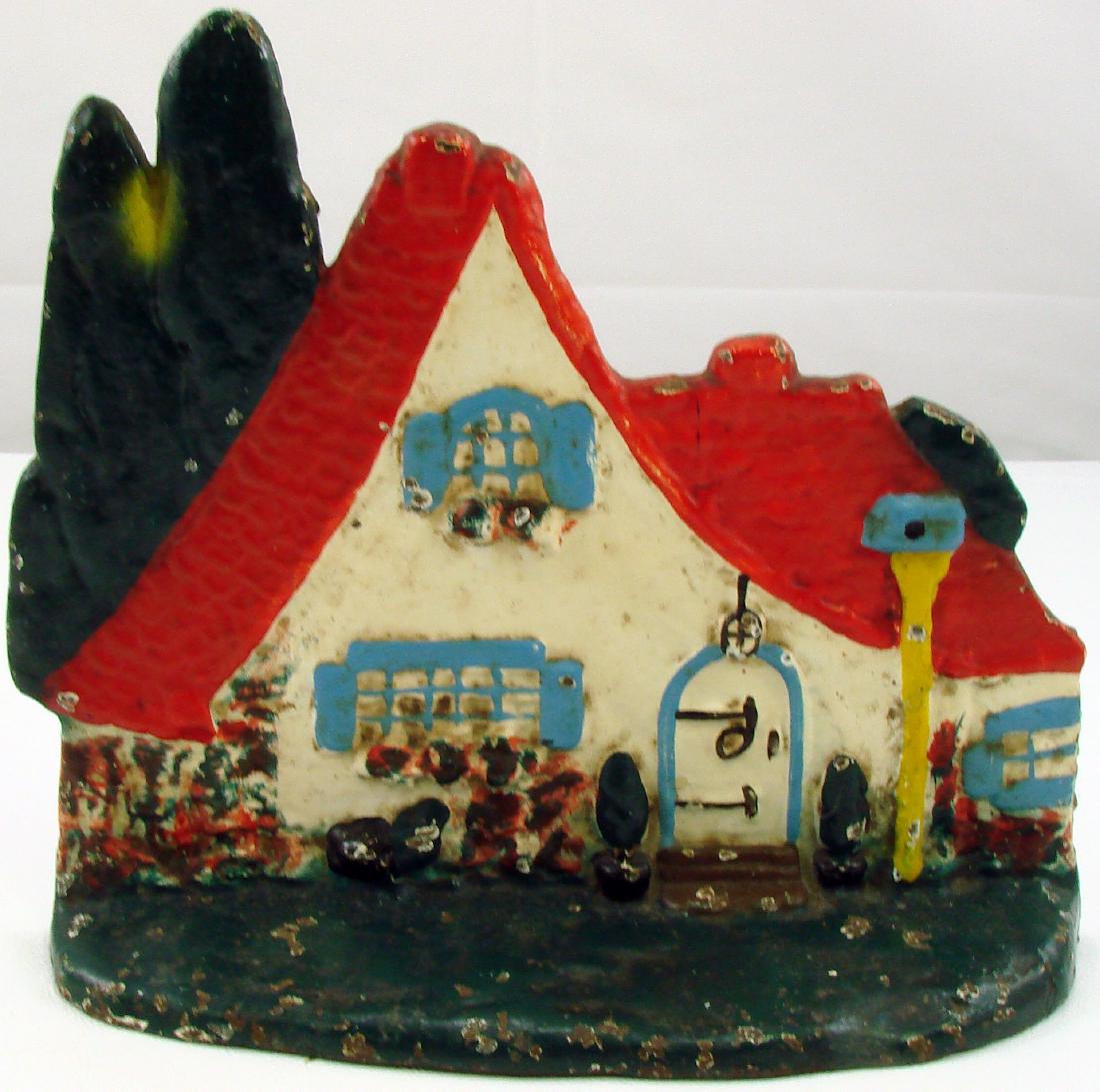 COTTAGE WITH RED ROOF DOORSTOP: Littco, painted cast iron; some scrapes and flakes in paint; L-9", G-VG