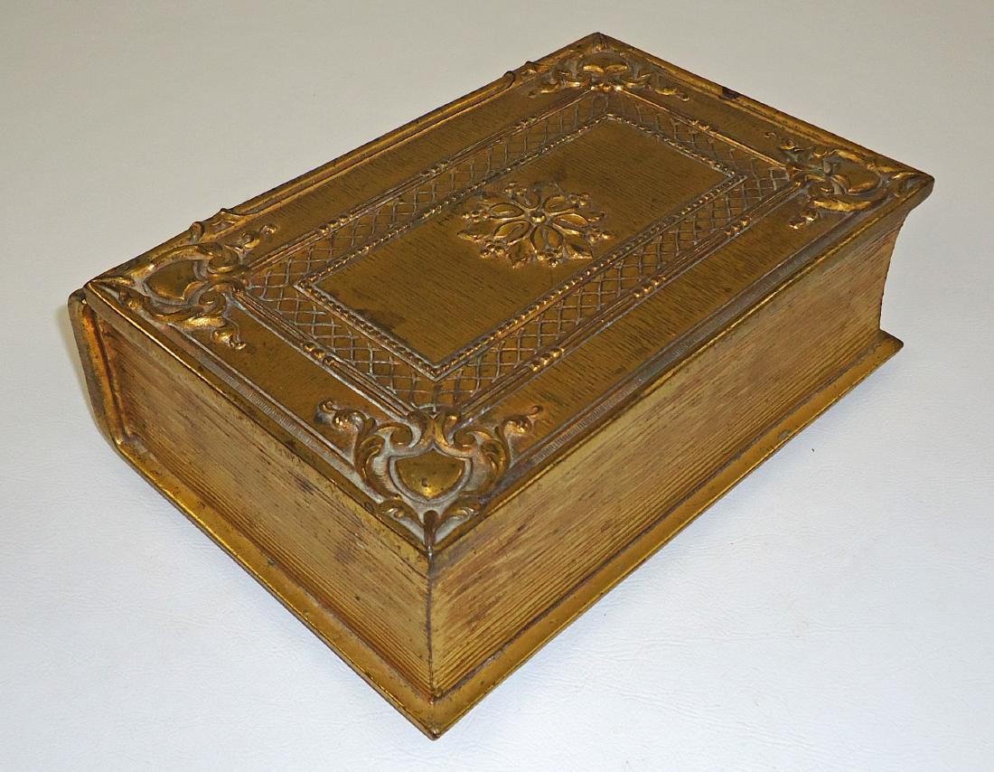 BOOK-FORM BOX JENNINGS BROS.: Bronze with brass finish; wood lined interior; bottom marked JB 2771; mionr scrapes, scratches and wear; L-9", G-VG