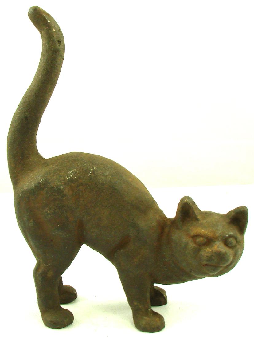 DOORSTOP CAT WITH TAIL UP: Cast iron; likely Hubley; some surface rust; no paint present; H-10 1/2", G