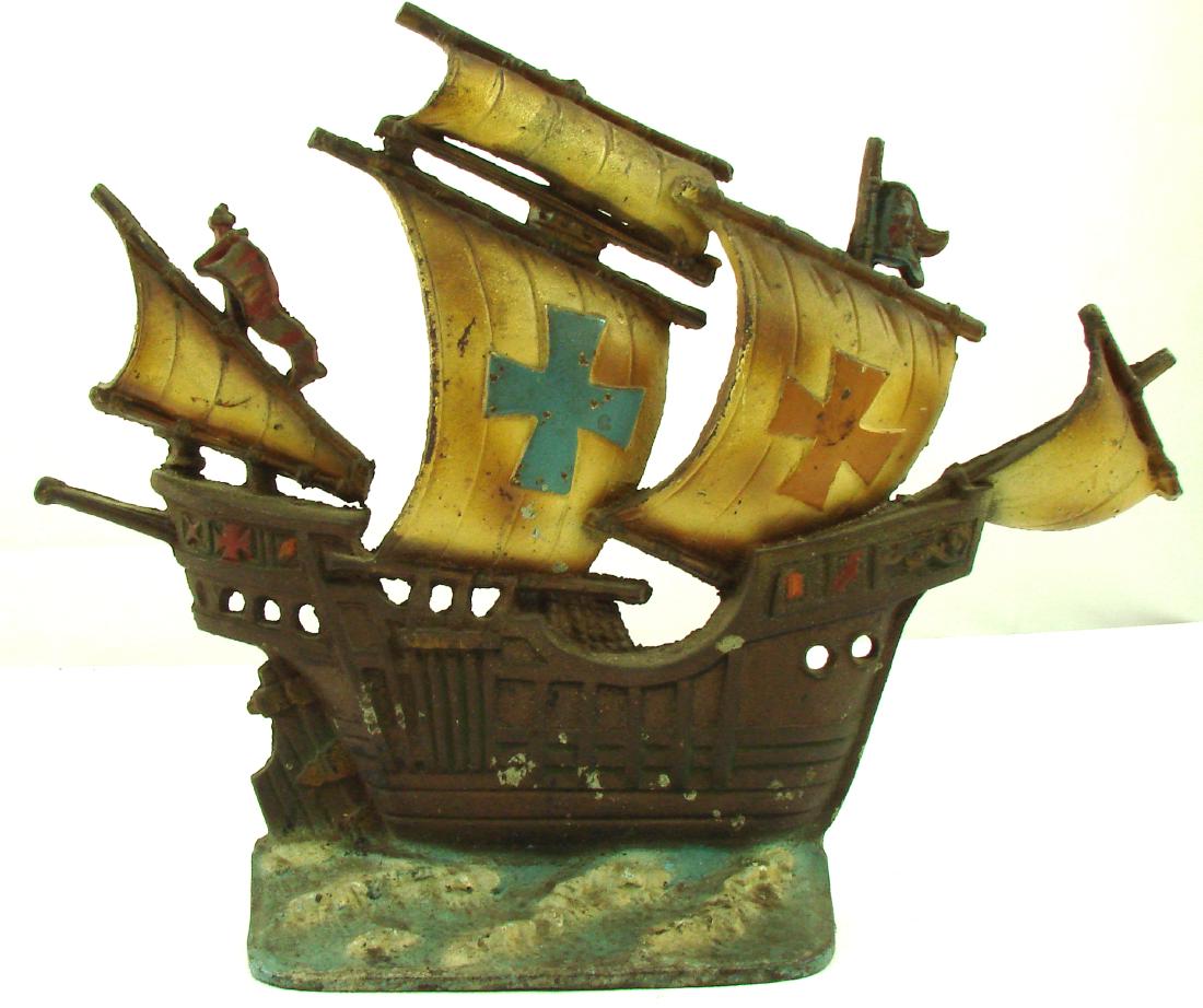 CAST IRON SPANISH GALLEON DOORSTOP: Painted cast iron; original paint; some minor surface rust and paint chips; L-13 1/2", VG