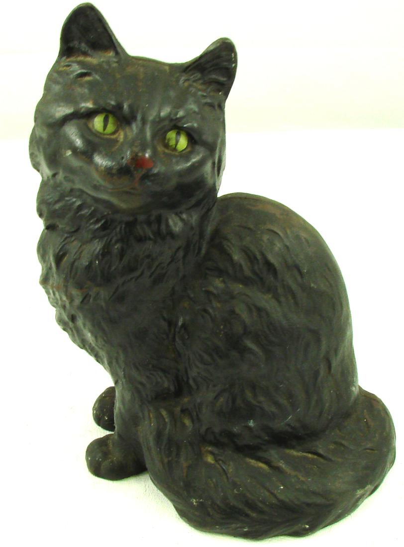 HUBLEY SEATED PERSIAN CAT DOORSTOP: Painted cast iron; paint chips to face, areas of paint wear; interior stamped Hubley; H-9", VG+