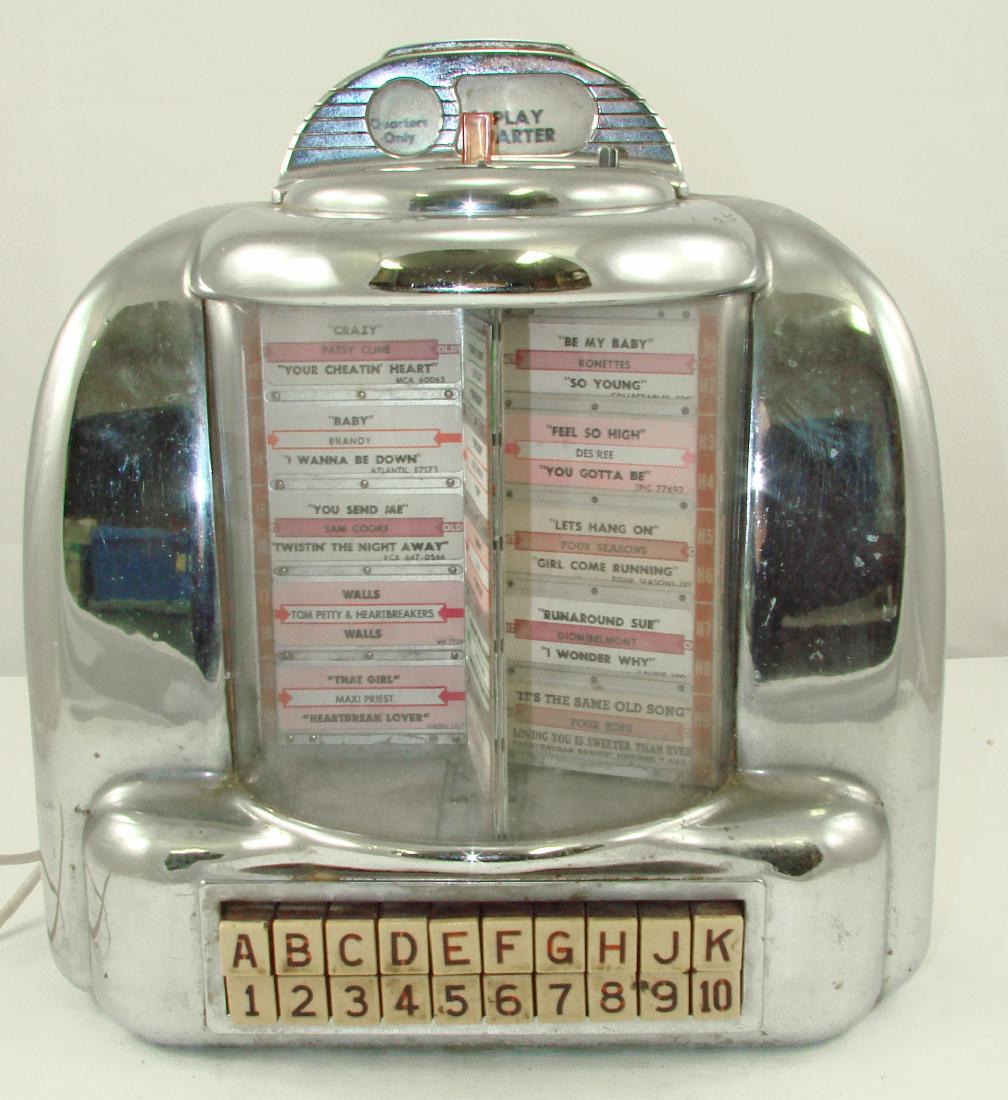 COIN-OP JUKEBOX SELECTOR BOX / REMOTE: Chrome plated metal with quarter slot; no key; wires cut; some wear to plating, mostly on bottom; 13" X 12" X 5", G-VG
