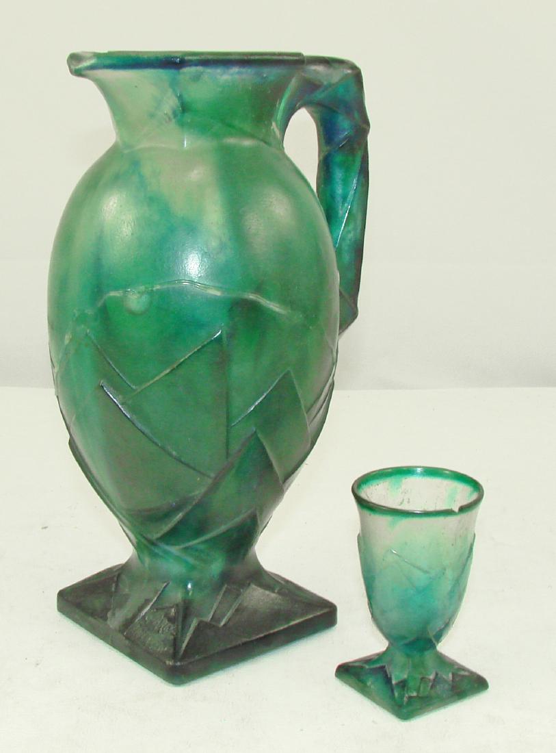 G. ARGY ROUSSEAU PATE DE VERRE EWER & CUP - DAMAGED: signed G. Argy Rousseau; Art Deco style Pate De Verre ewer and small cup; both broken and poorly re-glued; both pieces missing areas of glass; possible restoration project; ewer H-8 3/4", P
