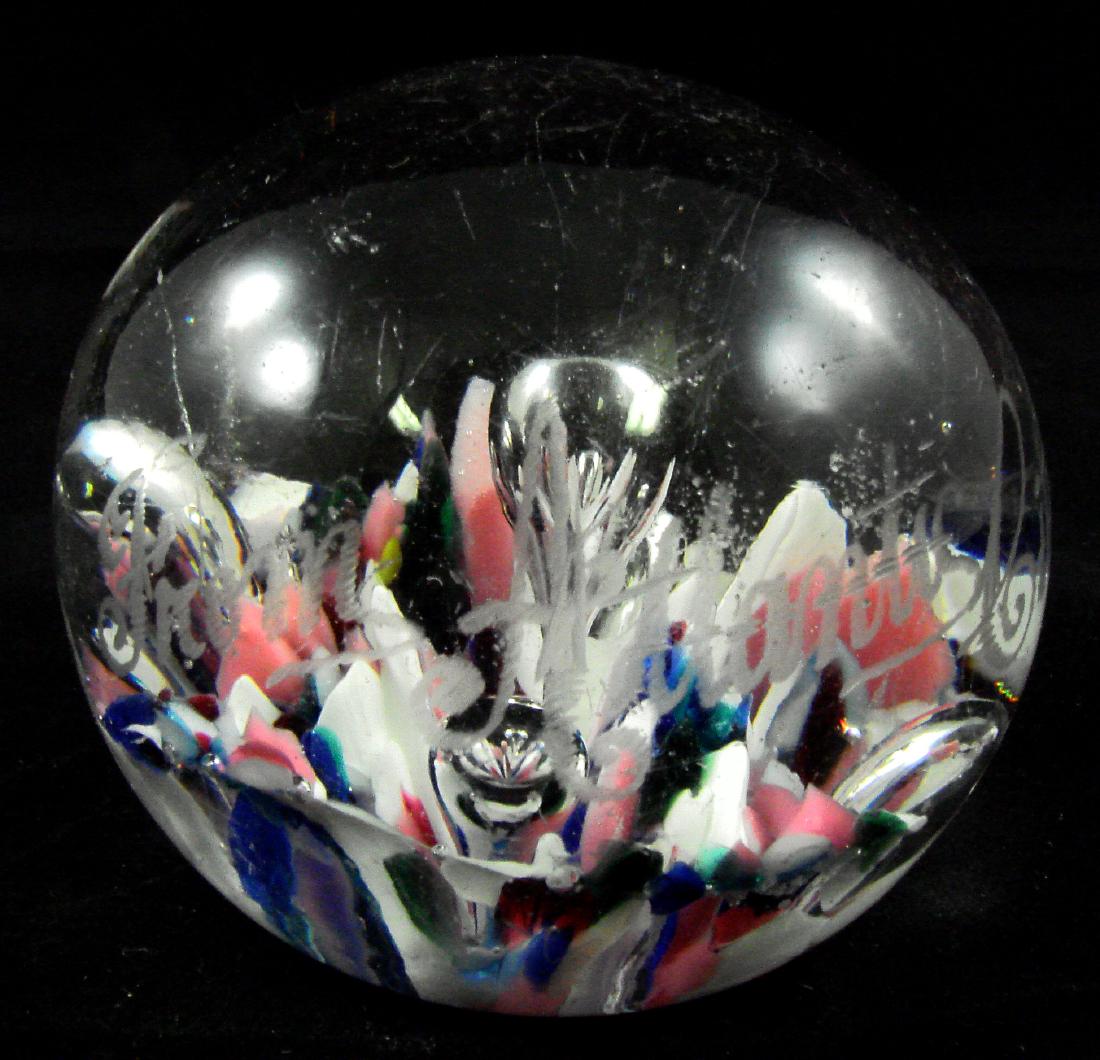 1895 SOUVENIR PAPERWEIGHT - ATLANTIC CITY: Art glass caned paperweight with bubbles; unsigned; etched "1895 Father to Eva From Atlantic City"; some wear and scratches to top; Dia.-3", G-VG