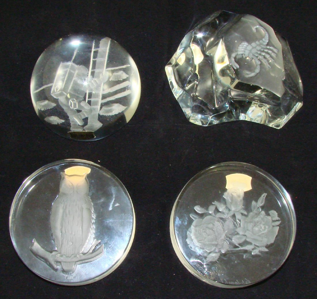 (4) VAL ST. LAMBERT PAPERWEIGHTS: (1) intaglio etched owl with foil sticker, reverse engraved "val"; (1) astronaut intaglio etched paperweight, etched signature "Val St. Lambert" and foil sticker; (1) scorpion with faceted "ice" form,