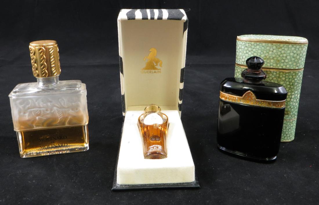 3) ART DECO VINTAGE PERFUME BOTTLES A GROUP OF ART DECO HATTIE CARNEGIE