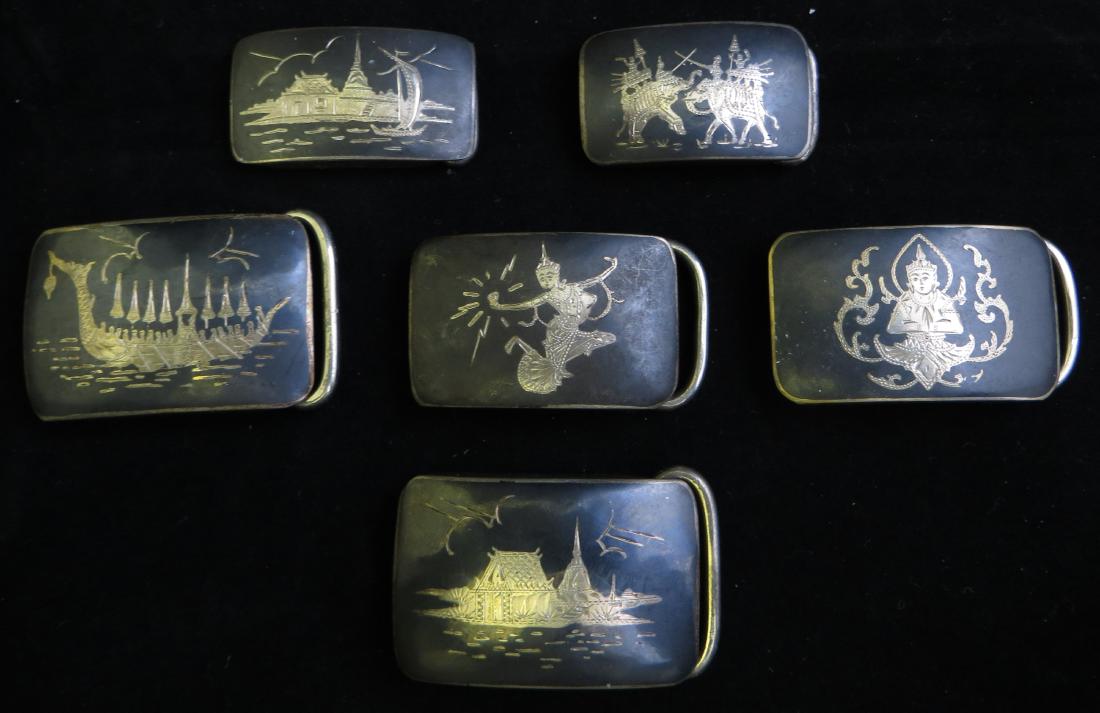 (6) VINTAGE SIAM STERLING BUCKLES: Niello sterling buckles, various scenes and deity images; all marked "Siam Sterling", longest L-1 7/8", 2.9 oz, total; EX