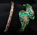 (2) HINGED BRACELETS