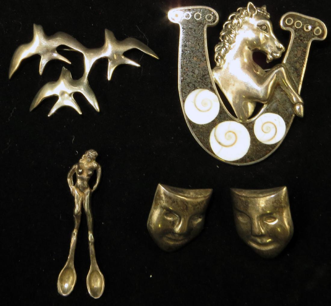 (4) PIECES STERLING, ETC. JEWELRY: (1) 925 sterling pin, horse with horseshoe and nautilus shells, can be worn as a drop; (1) pair sterling mask earrings; (1) sterling pendant, nude woman with spoon-like feet; (1) three flying birds pi
