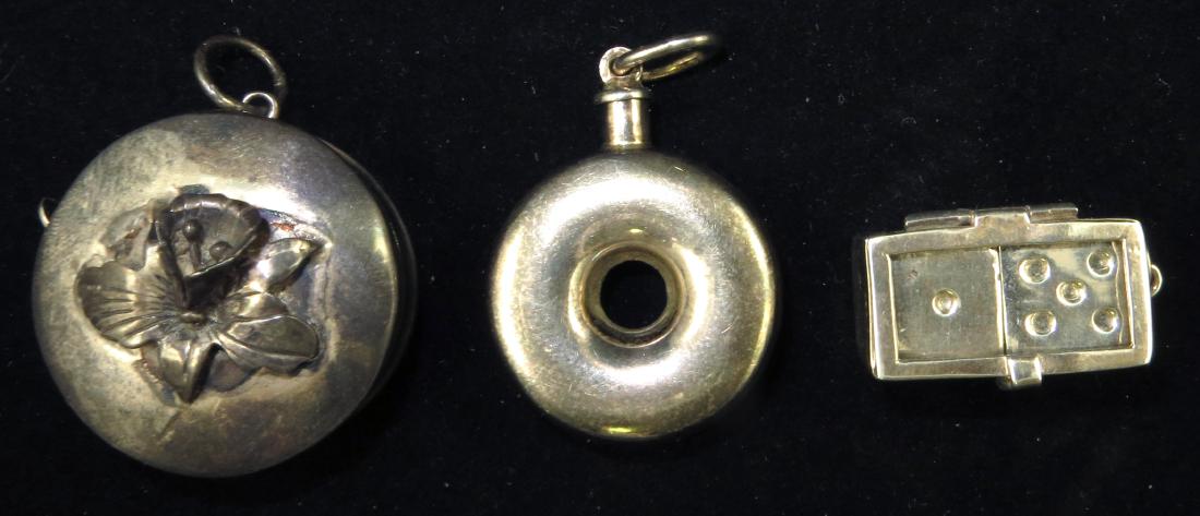 (3) STERLING PENDANTS/OBJECTS: Includes: (1) ring form perfume, bail marked "Italy"; (1) Sterling tape measure with orchid ornament, marked "REO Sterling 925", (1) sterling pendant / dice holder, largest L-1 1/4", VG+