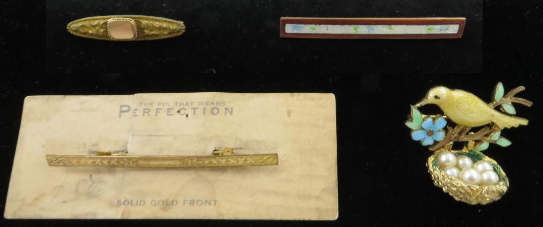 (4) PCS. GOLDTONE EARLY COSTUME JEWELRY: Includes: (1) goldtone pin, L-1 1/2"; (1) goldtone bar pin with enamel border and floral front, L-2 1/8"; (1) bar pin, on original card "solid gold front" with etched design, splits and heavy wear to 