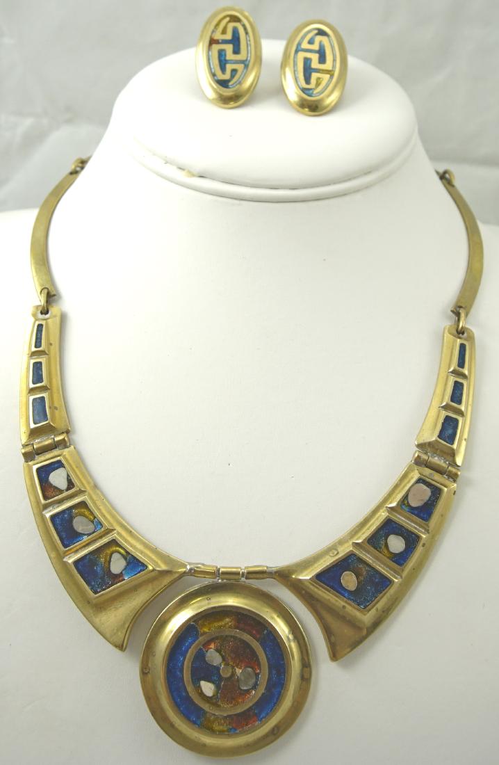 MID CENTURY BRASS & ENAMEL NECKLACE & EARRINGS SET: unsigned; well made choker necklace; jointed and hinged construction, enameled panels and central medallion; matching oval enamel clip-on earrings; some distortion to back clasp; inside Dia.-5", earri