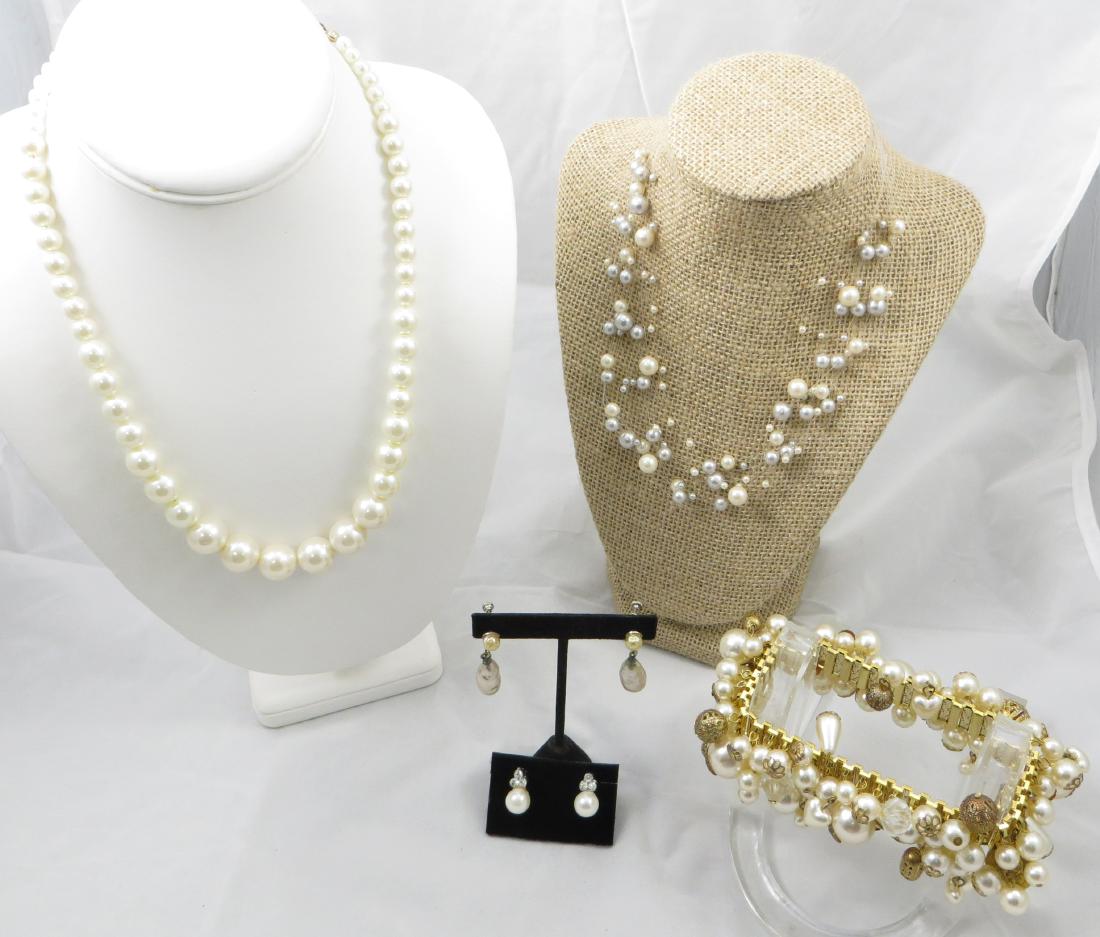(5) PIECES PEARL VINTAGE JEWELRY: Includes: (1) goldtone expandable bracelet set with many faux pearls and gold tone baubles; (1) faux pearl graduated choker, L-20 3/4"; (1) nine strand "floating" faux pearl choker, L-17 1/2"; (1) pai