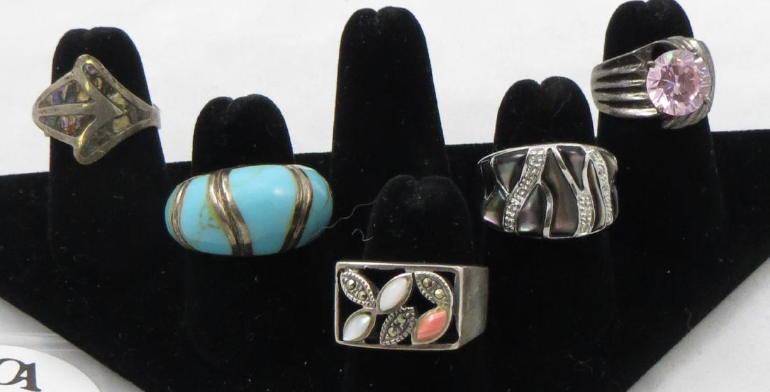 (5) STERLING RINGS, MARCASITE, MOTHER OF PEARL, ETC.: Includes: (1) ring set with marcasite, coral, moonstone, etc., ring size: 8 ; (1) sterling dome style ring set with turquoise, (1) turquoise panel missing, ring size: 8 ; (1) sterling ring set with pi