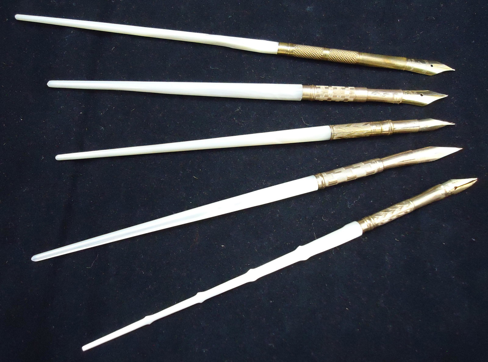 (5) VINTAGE MOTHER OF PEARL DIP PENS: (1) Stainless steel ferrule, #6 Signature nib; (1) Grieshaler Chicago nib; (1) Norton & Son, NY, No. 2; slit in nib holder; (1) Iridium nib - shaft holder has engraved initials; (1) Signature 4, made 