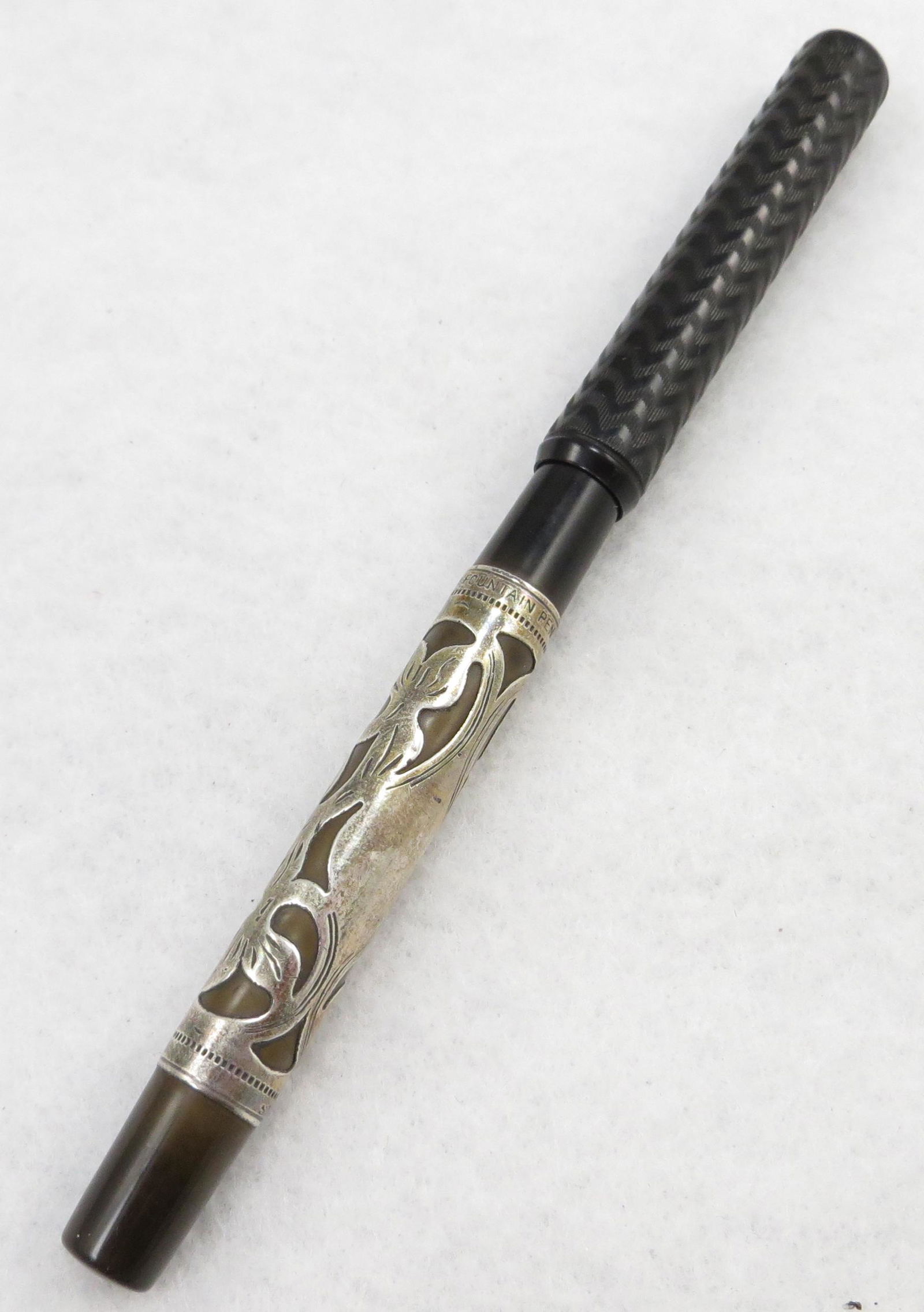 VERY EARLY WATERMAN #12 FOUNTAIN PEN: Sterling filigree barrel; eyedropper; replaced cone cap; Waterman's Ideal #2 nib; L-4 3/4" (not including cap); overall VG