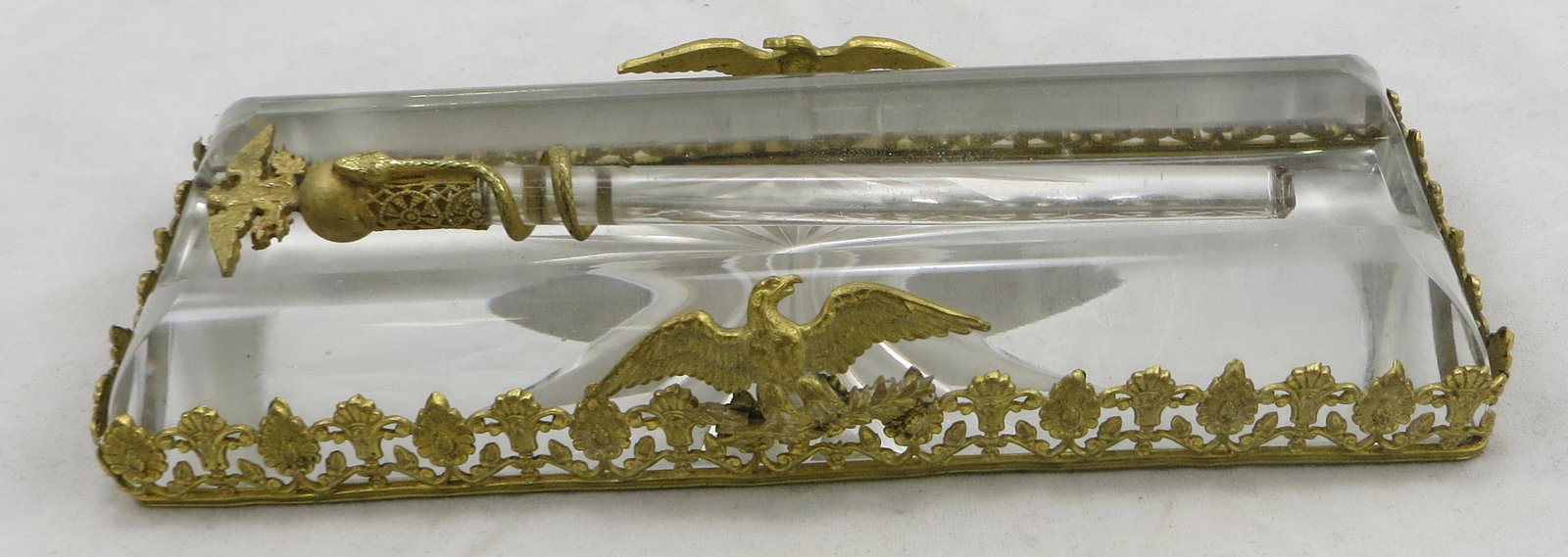 GLASS & METAL DESK SET: Metal filigree with eagle; pen matches, with eagle and snake motif; glass ord broken; normal wear; L-5 1/2", G-VG