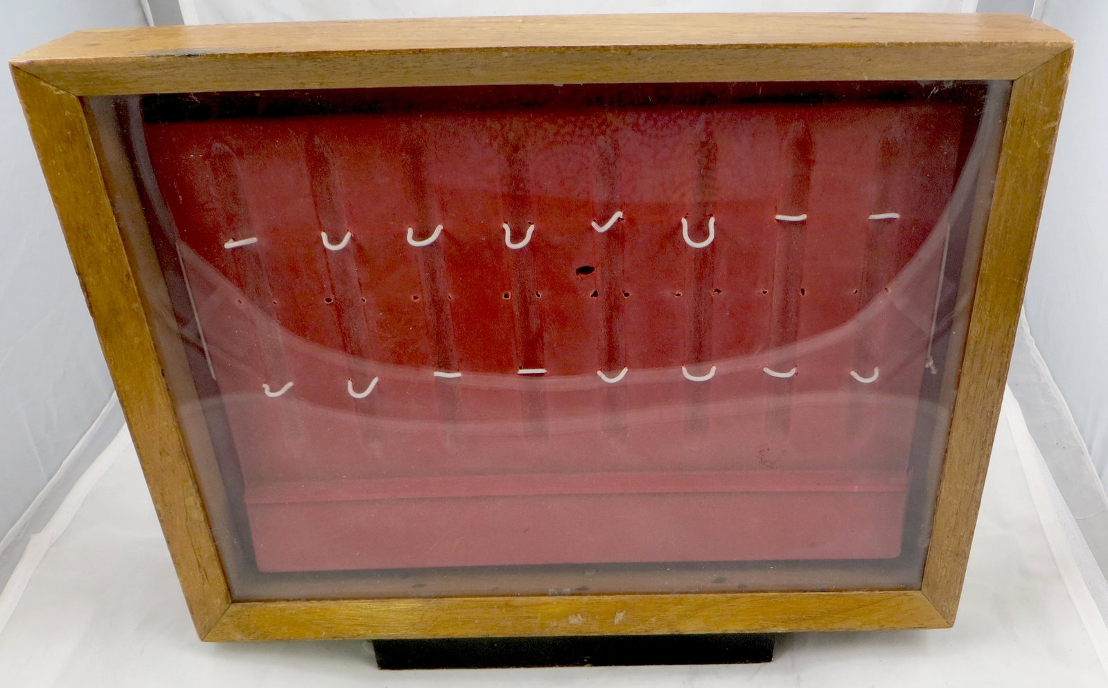 VINTAGE COUNTER PEN DISPLAY BOX: Wood; plexiglas front; red plastic pen holder inside, probably assembled; bottom of base reads: Made in USA No. 20242; latch on back to open; H-11, W-13", F-G