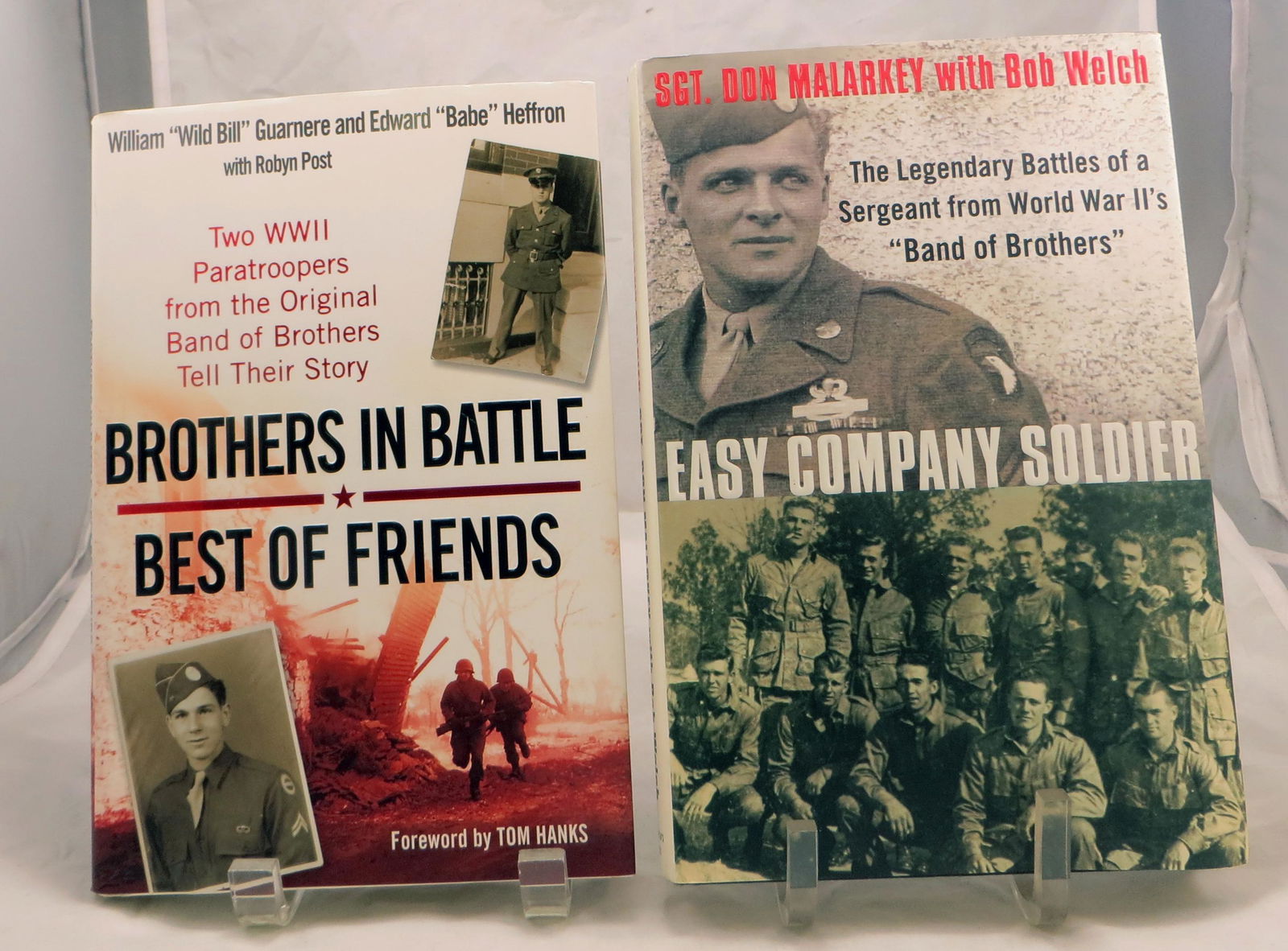 (2) WORLD WAR II "BAND OF BROTHERS" THEME BOOKS, SIGNED: (1) Malarkey, Sgt. Don and Welch, Bob; "Easy Company Soldier - The Legendary Battles of a Sergeant from World War II's 'Band of Brothers'"; New York, St. Martin's Press; 2008; retains dust jacket; [27