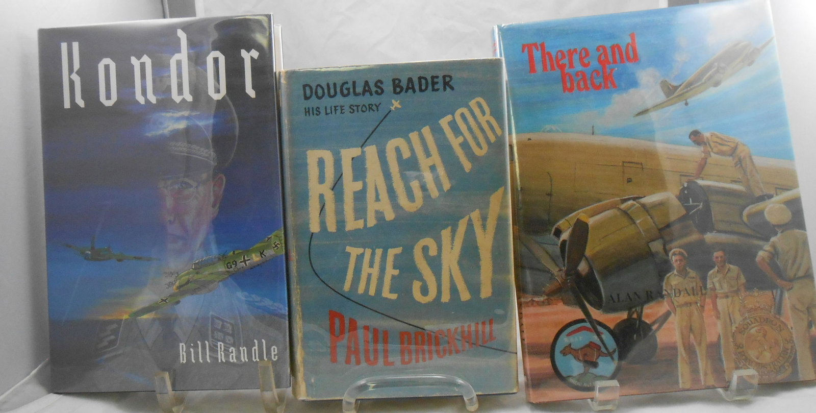 (3) WORLD WAR 2 AVIATION BOOKS, SIGNED: BRICKHILL,: (1) Brickhill, Paul; "Dougleas Bader, His Life Story - Reach for the Sky"; St. James Place, London; Collins; 1954; retains dust jacket; pasted in signature on title page; [384 pgs]; likely first editi