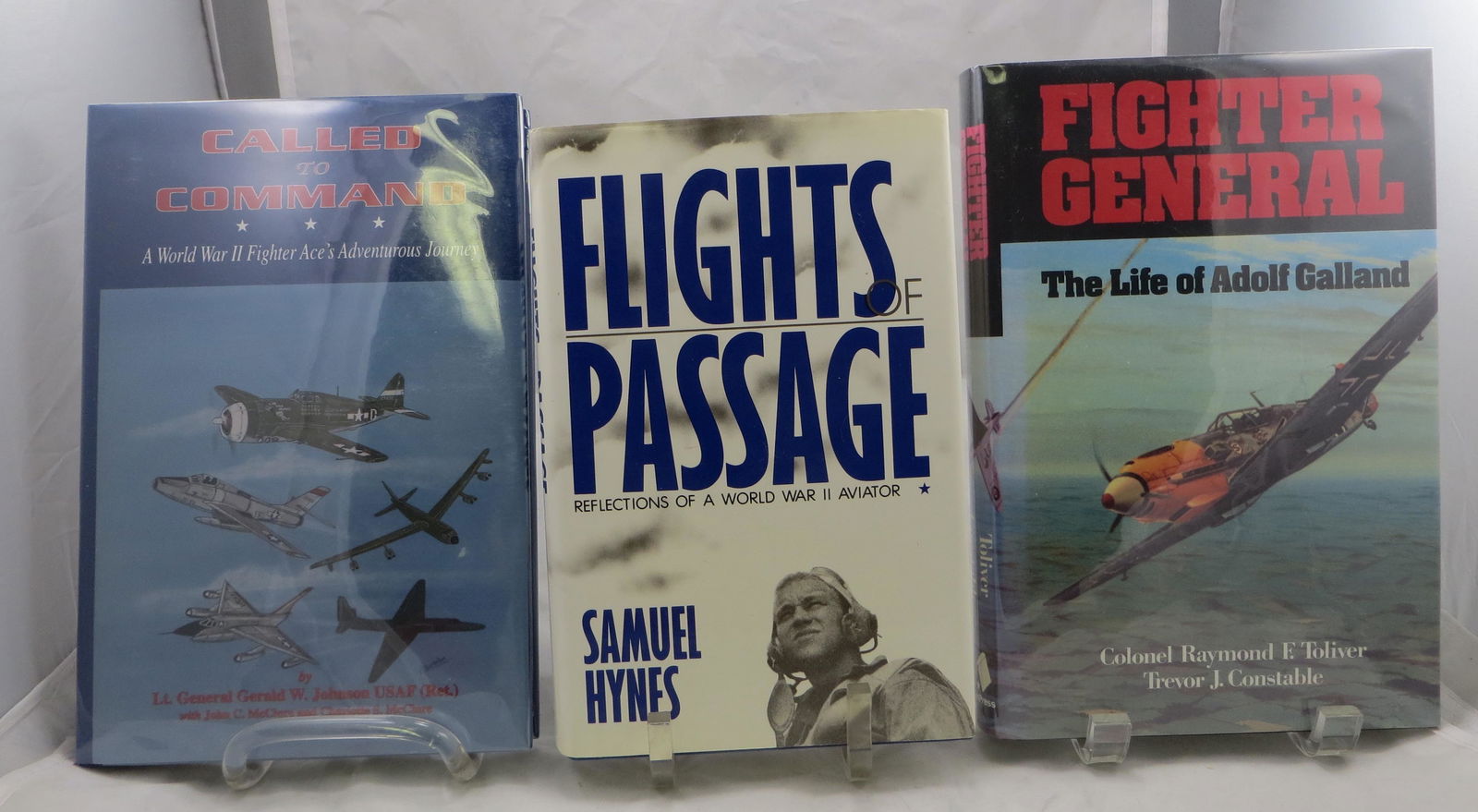 (3) WW2 BOOKS - AVIATORS: GALLAND, HYNES, JOHNSON,: (1) Hynes ,Samuel; "Flights of Passage, Reflections of A World War II Aviator"; Frederic C. Beil, New York and Naval Institute Press, Annapolis MD; 1988; first edition; retains dust jacket; [270 pgs];