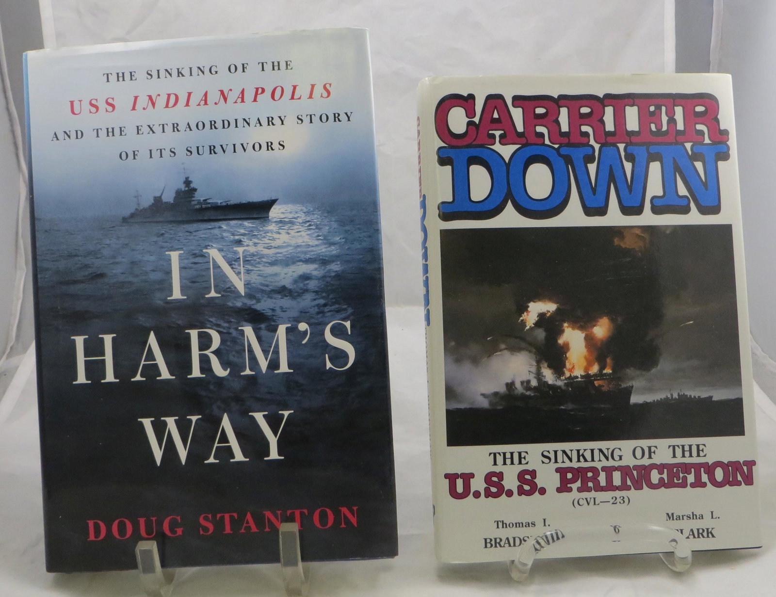 (2) WORLD WAR II BOOKS: SINKING SHIPS: USS PRINCETON &: (1) Bradshaw, Thomas I. and Clark, Marsha L.; "Carrier Down - The Story of the Sinking of the USS Princeton (CVL-23)"; Austin, Texas; Eakin Press; 1990; first edition; retains dust jacket; [224 pgs]; 