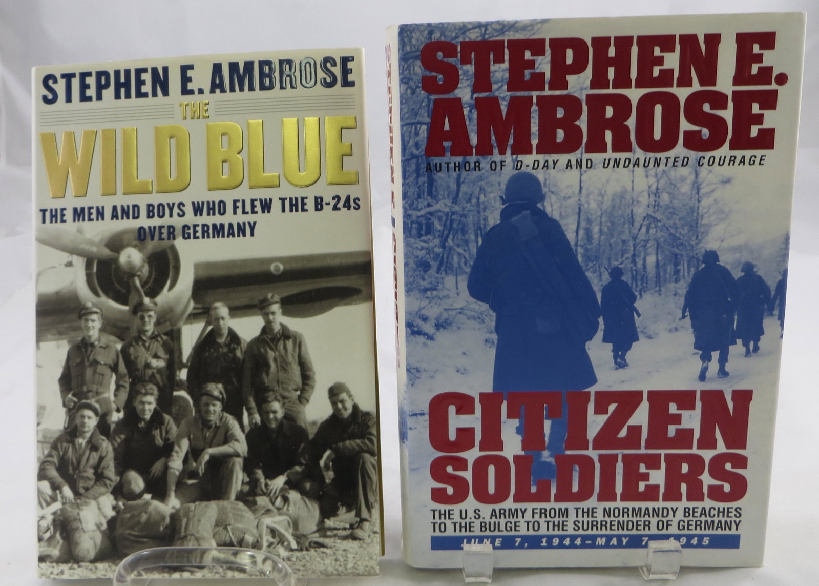 (2) SIGNED STEPHEN AMBROSE WW2 BOOKS: WILD BLUE,: (1) Ambrose, Stephen E.; "The Wild Blue - The Men and Boys Who Flew the B-24s Over Germany"; Simon & Schuster, New York; 2001, likely first edition; retains dust jacket; [299 pgs]; author signed bookp