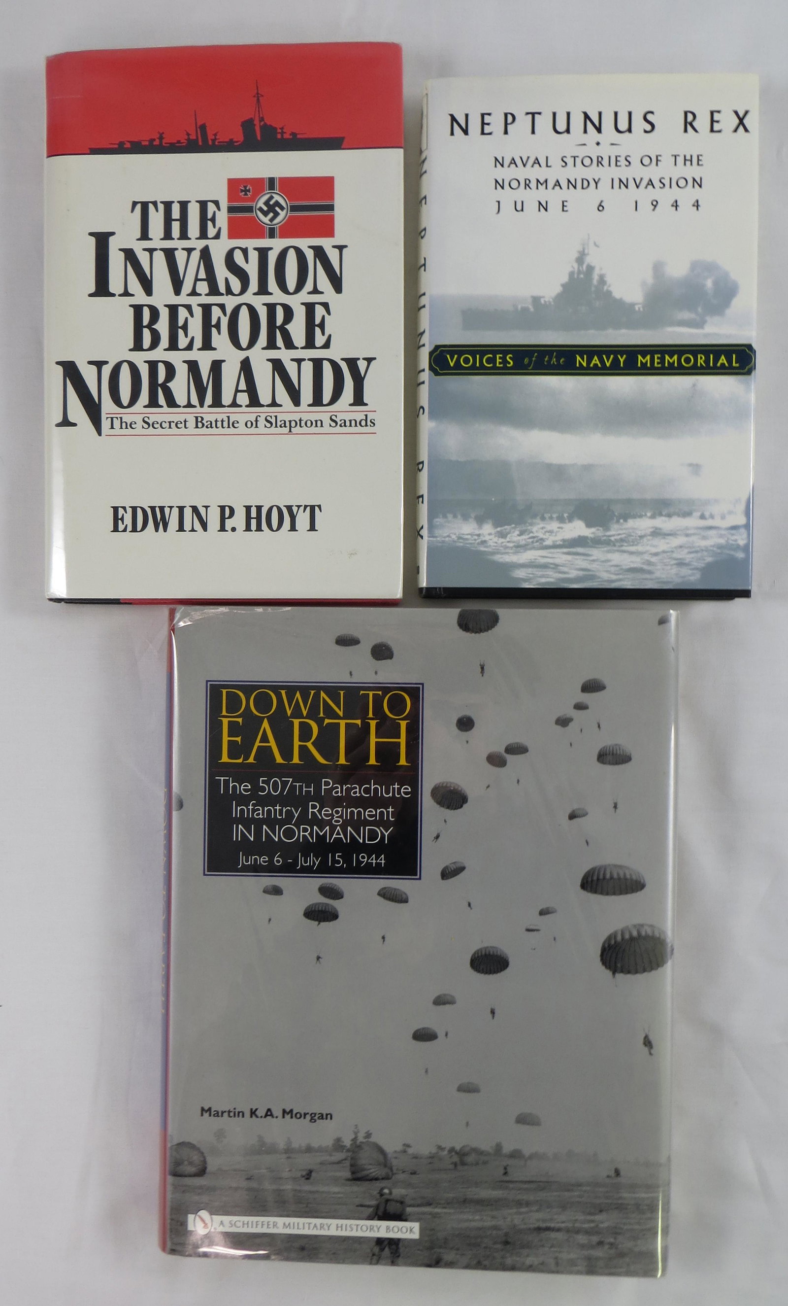 (3) WW2 BOOKS RELATING TO THE NORMANDY INVASION, SIGNED: (1) Prados, Edward F. (editor); "Neptunus Rex: Naval Stories of the Normandy Invasion, June 6, 1944"; Presidio; 1998; retains dustjacket; [304 pgs]; illustrator, Tracy Sugarman signed bookplate on hal