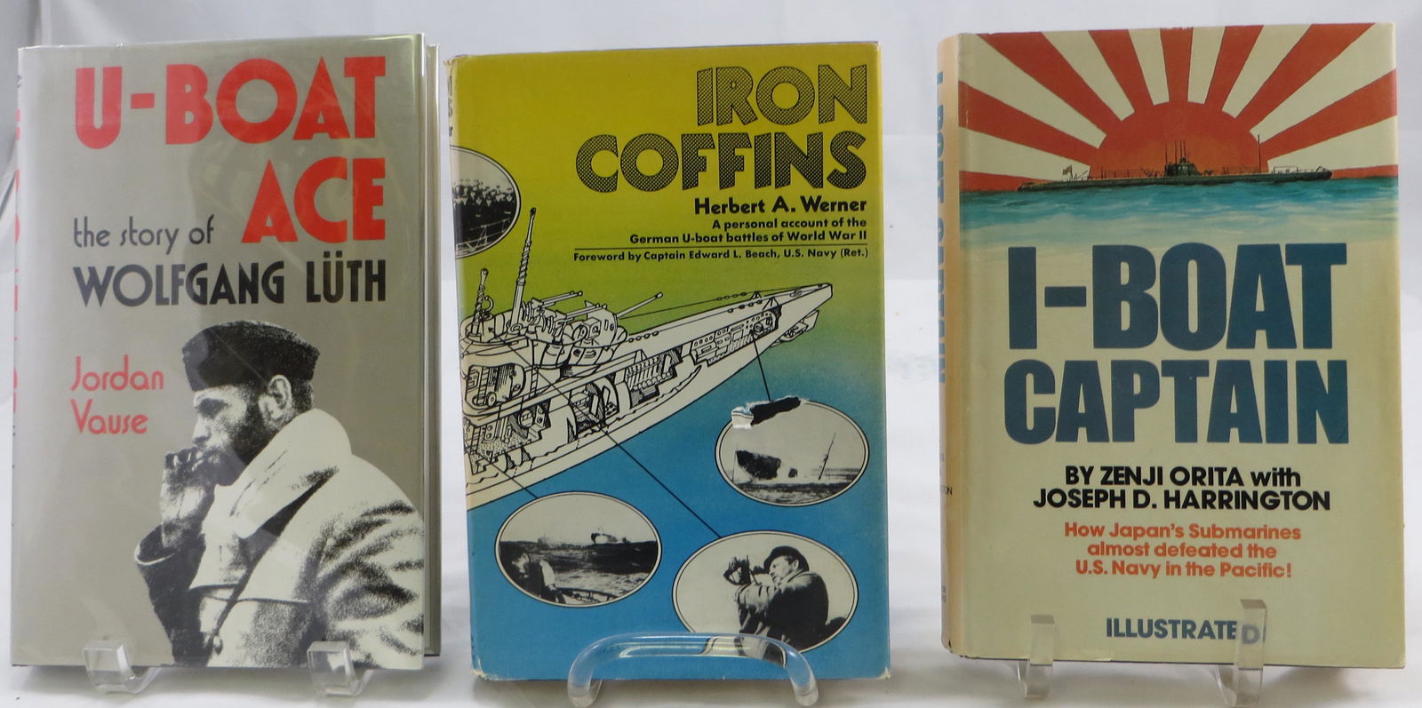 (3) WORLD WAR 2 BOOKS - U-BOATS & i-BOAT: (1) " U-Boat Ace - The Story of Wolfgang Luth", Jordon Vause, 1990; (1) "Iron Coffins", Herbert A Werner, 1969; "I-Boat Captain", Zenji Orita with Joseph D Harrington, 1976; All with dust jackets VG -