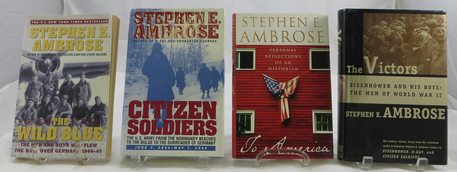 (4) WORLD WAR 2 BOOKS - by STEPHEN E AMBROSE: (1) " The Wild Blue" Stephen E Ambrose, 2002, paper back; (1) " Citizen Soldiers" Stephen E Ambrose, 1997; (1) " The Victors", Stephen E Ambrose, 1998; (1) "To Amercia", Stephen E Ambrose, 2002; 3 hav
