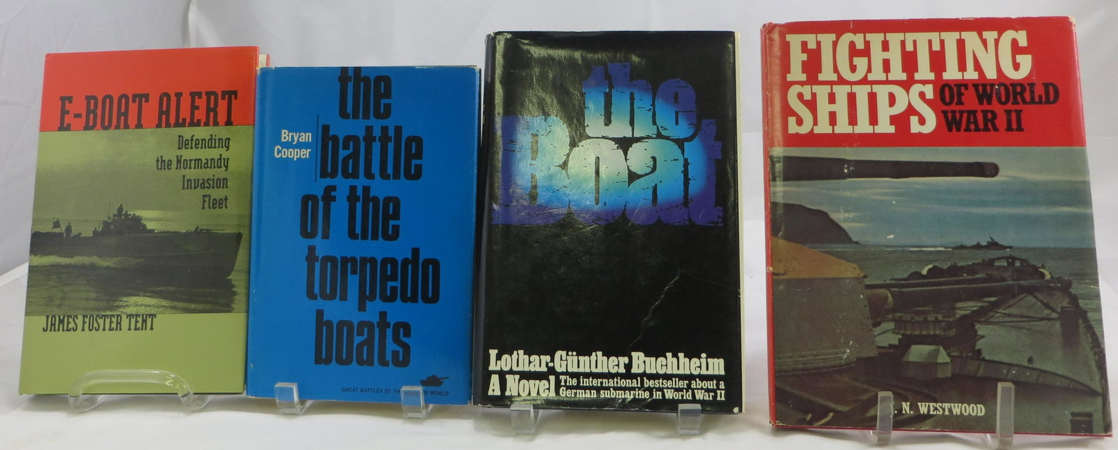 (4) WORLD WAS II BOOKS - SHIPS AND BOATS: (1) "Fighting Ships of World War II", J. N. Westwood , 1975; (1) " E-Boat Alert", James Foster Tent, 1996, First Printing; (1) "The Boat", Lothar-Gunther Buchheim, 1975; (1) " The Battle of The Torped