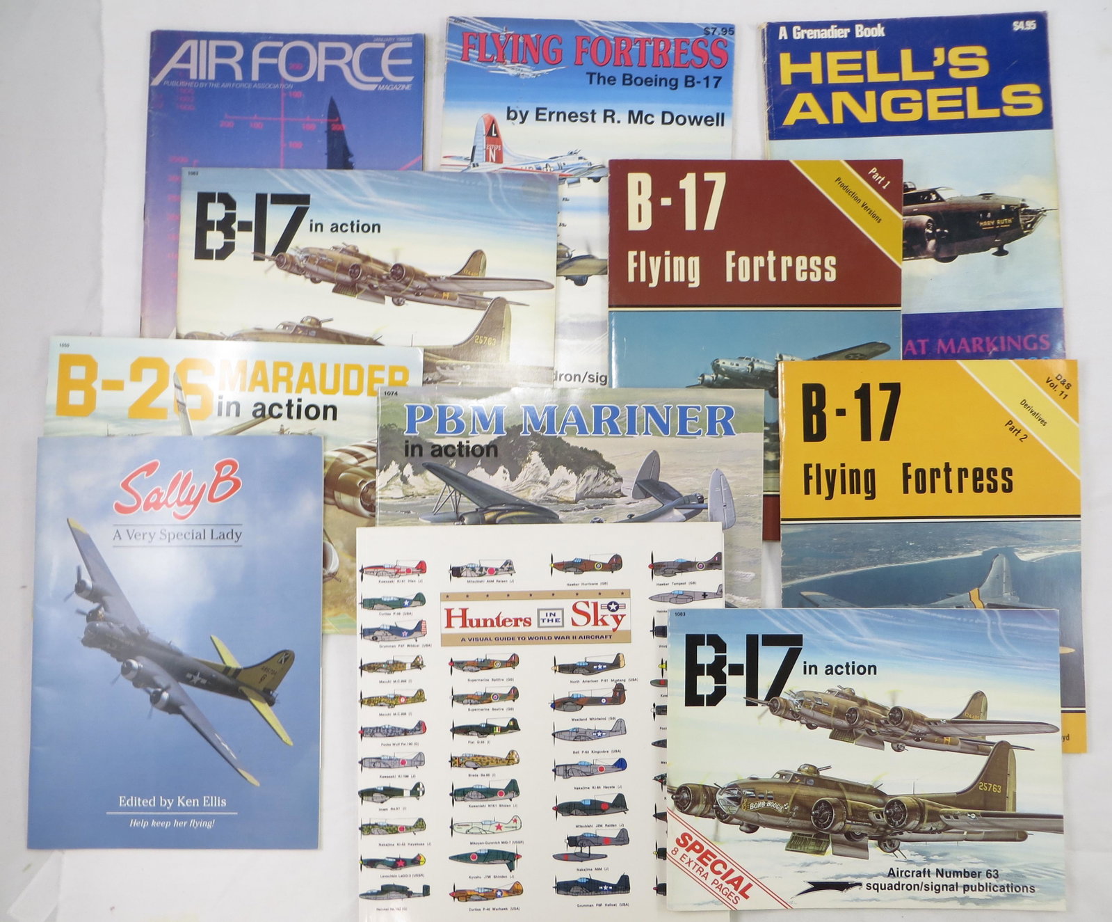 (11) WORLD WAR II BOOKS - PAPERBACK AIRCRAFT: (2) "B-17 Flying Fortress" part 1 & 2, 1983; (2) "B-17 In Action", 1984; (1)" B- 26 Marauder In Action", 1984; (1)" Sally B", 1992; (1) "PBM Mariner In Action", 1996; (1) "Hell's Angels, 1969; (1) "Fl