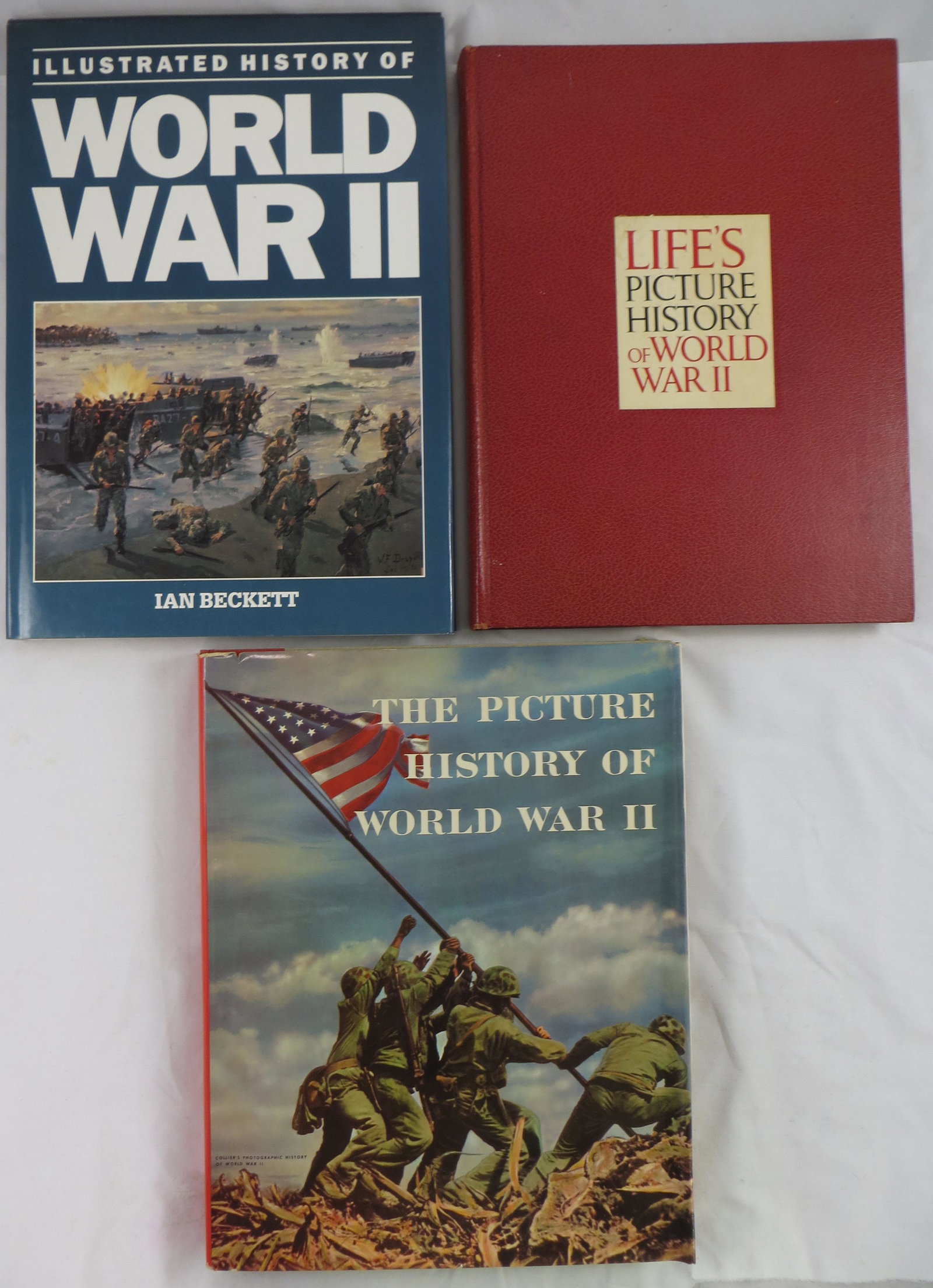 (3) WWII BOOKS: (1) Illustrated History of WWII by Ian Beckett; Bison Books Corp 1988, has dustjacket; (1) The Picture History of WWII; Grosset & Dunlap Publishers, Originally Collier's Photographic History of WWII, 