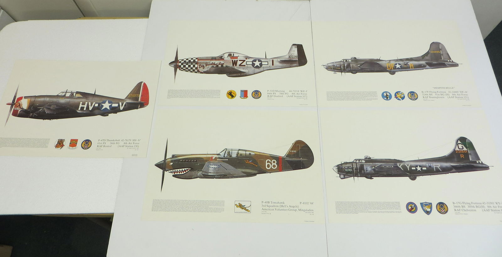 (5) WWII FIGHER PLANE SQUADRON PRINTS: (1) P-47D Thunderbolt 42-76179 HV-V 61st FS-56th FG-8th Air Force; RAF Boxted (AAF Station 150 - April 1944); © Dugald Cameron 1985, no. 183; (1) P-40B Tomahawk P-8102 '68' - 3rd Squadron (Hell's Ang