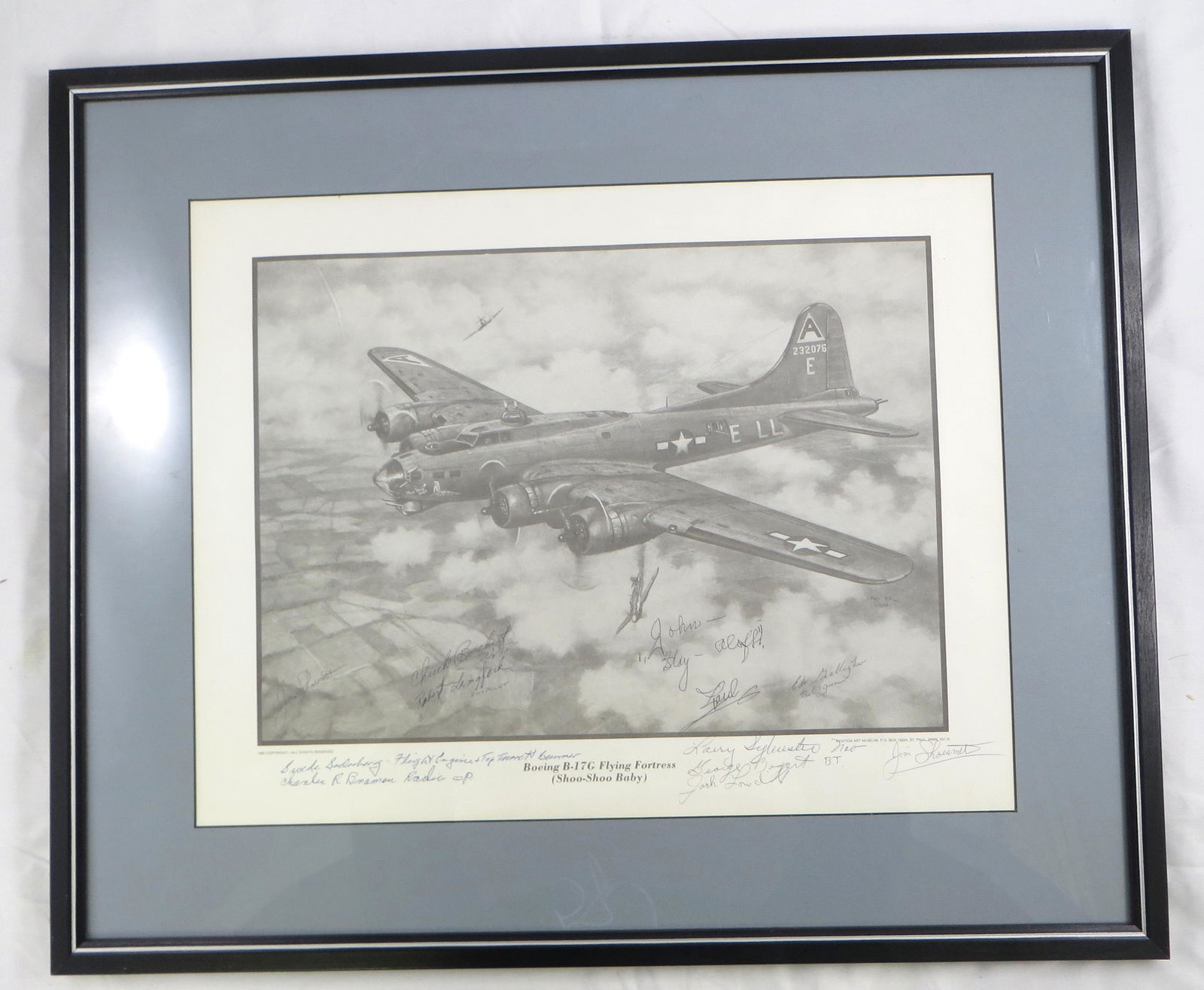 WWII SHOO-SHOO BABY SIGNED KEN FRY PRINT: Signed by: Chuck Bochert, Robert Lankford, Ed Gallagher, George Bogart, Jim Shoesmith, Larry Sylvester, Swede Sodenburg, Charles Bramon and Jack Lowden; professionally framed and matted; framed size 2
