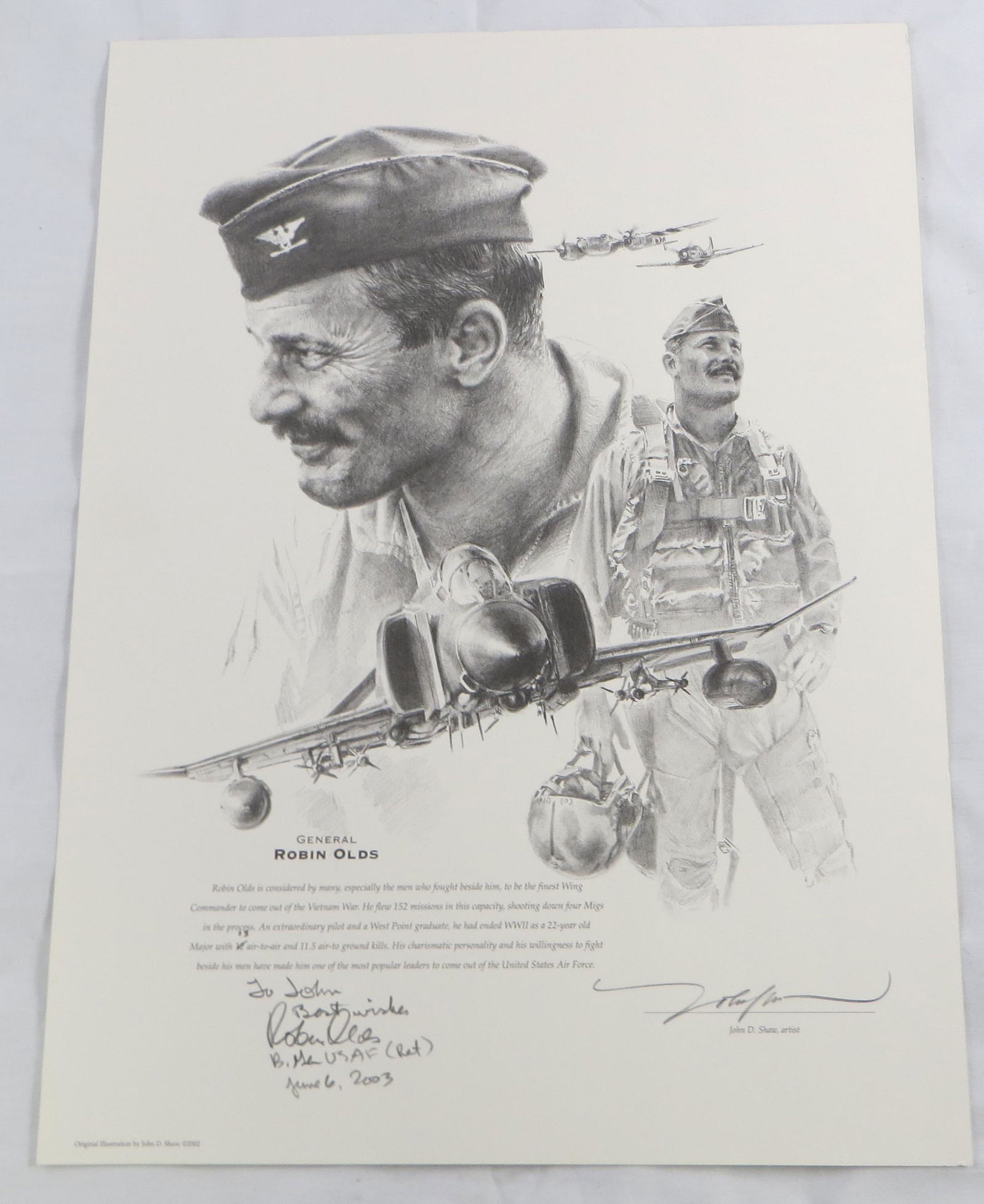 (2) SIGNED WWII PRINTS: (1) General Robin Olds, by artist John Shaw; signed by both; (1) M. Wooten limited edition print, signed by Rudolf Hoffmann, Reinhard Hardegen and Horst Von Schroeter; largest 17 1/2" x 21", VG-EX