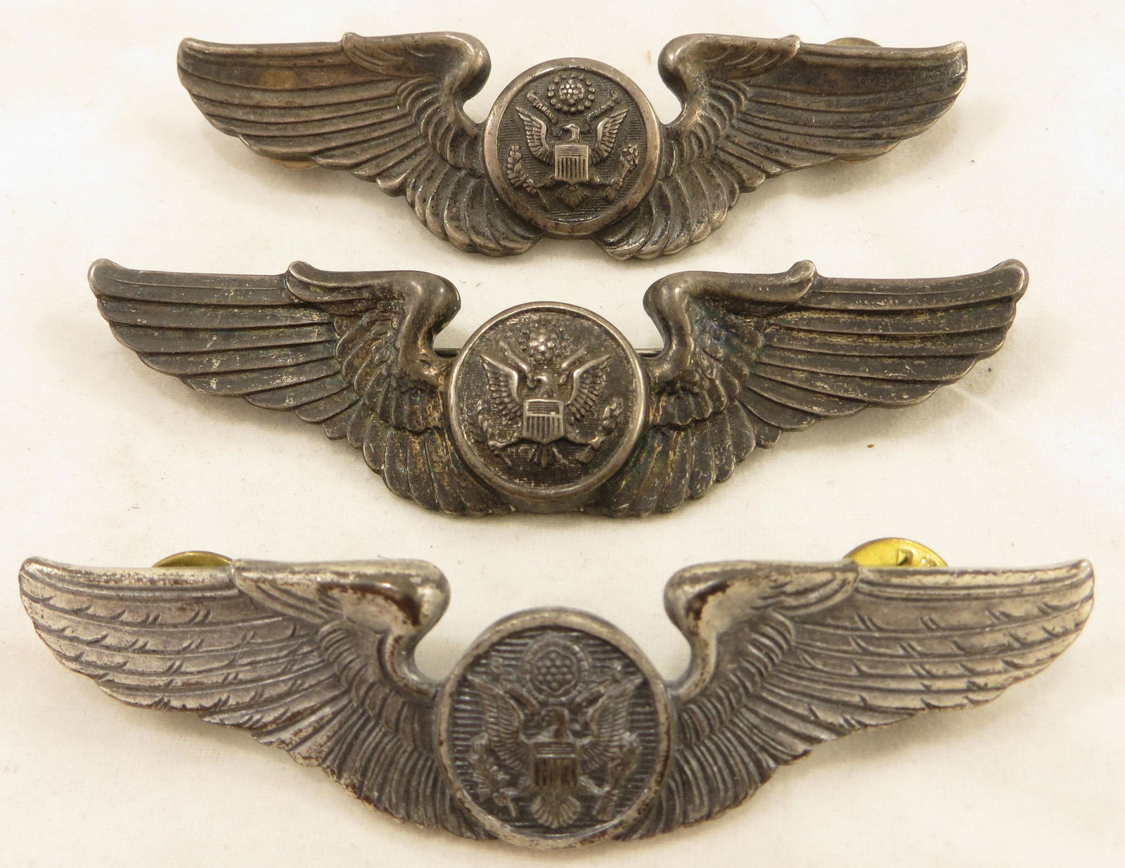 (3) U.S. MILITARY ARMY AIR FORCE AIR CREW WINGS: (1) sterling with pin back; (1) sterling with double tac pins; (1) 1/20 S.F.G.I; L-3", VG