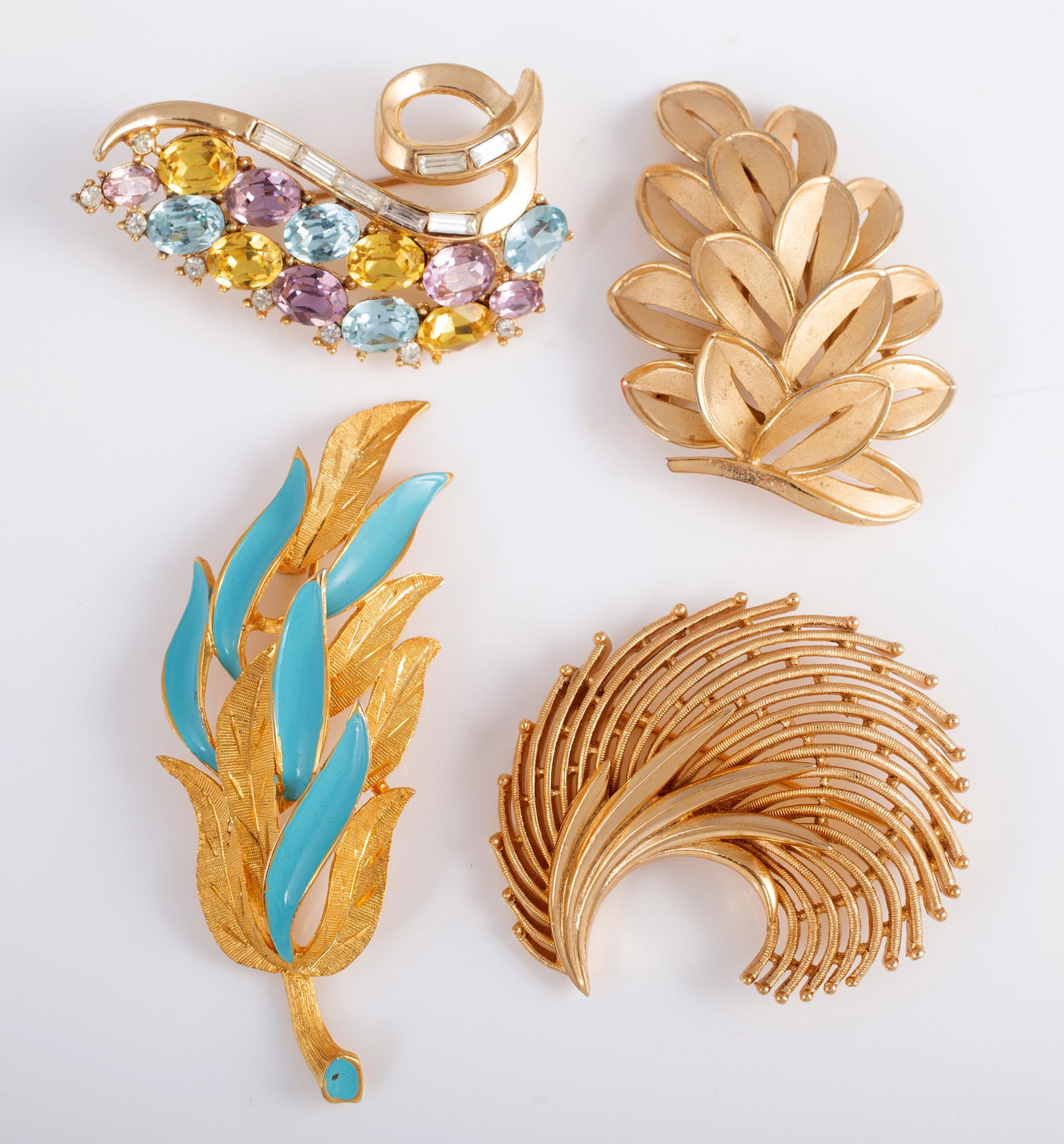 DESIGNER BROOCHES - KRAMER, TRIFARI (4): (3) Trifari, 1-with original tag; (1) Kramer, longest 3", VG-EX