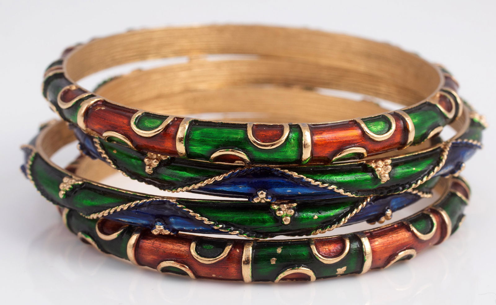 (4) JEWELTONE TRIFARI BANGLES: (2) sets of matching bangles: 1-pair red and green, 1-pair blue and green; some minor wear and enamel loss; gold tone interior, Dia-2 1/2", VG-EX