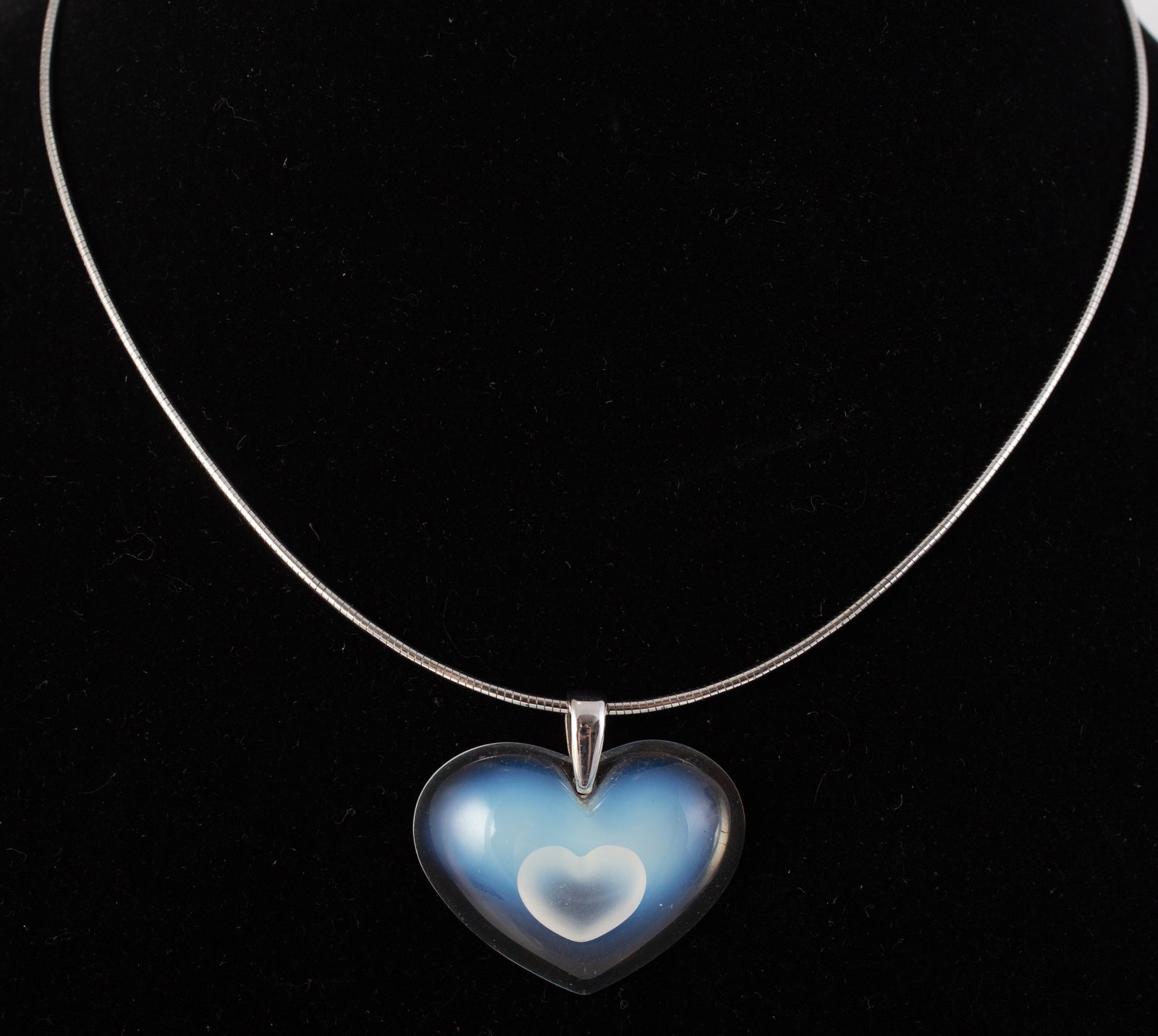 LALIQUE HEART JEWELRY (2): Pair of goldtone pierced french hook earrings, 1- with slight bruise to reverse, retains original box; L-1 1/2"; (1) sterling snake chain necklace with opalescent heart charm; retains original sleeve 