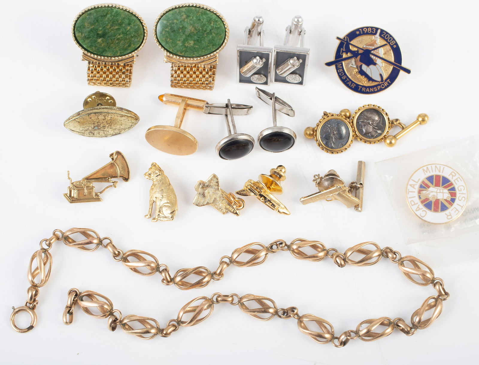 LOT OF ASSORTED MENS JEWELRY - CUFFLINKS, ETC.: Includes gold filled watch chain; (4) pairs cufflinks, including GE fuse links; Nipper & RCA Victor pins; Medstar transport and Capital Mini Register pins; Colt tie-tac, etc.; space shuttle tie tac an