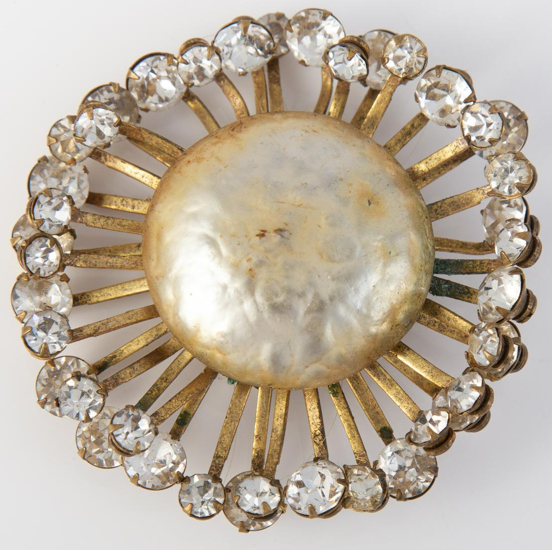 MIRIAM HASKELL STARBURST BROOCH: Faux baroque pearl center with radiating clear rhinestones; signed on reverse, Dia. 2 1/8", EX